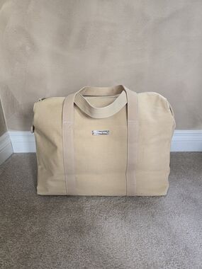 Michael Kors Canvas Travel Weekender in Beige
